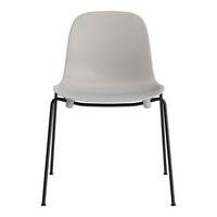 Gray plastic chair with a sleek design, featuring a smooth finish and contrasting black metal legs.