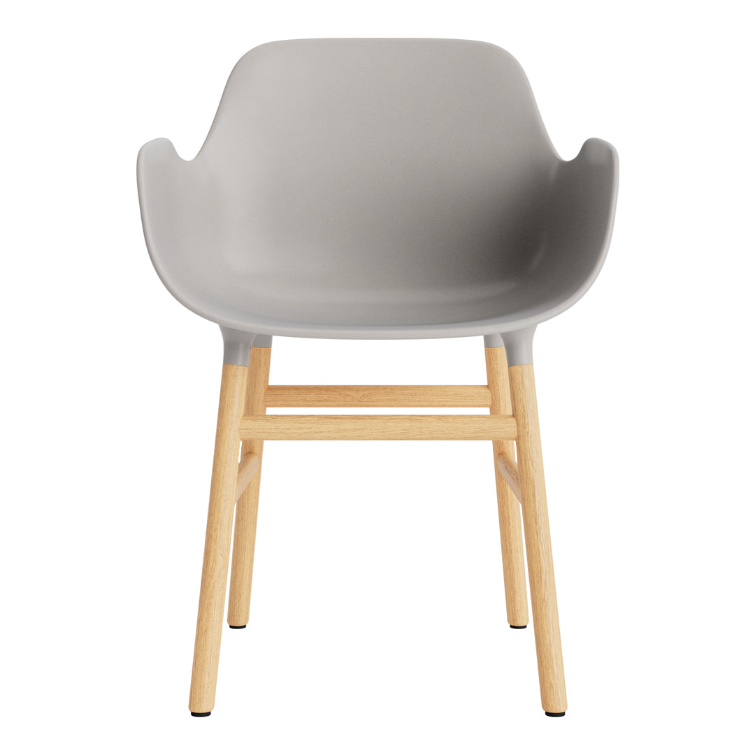 Gray plastic chair with natural wood legs, featuring a minimalist design and smooth finish. Ideal for modern decor.