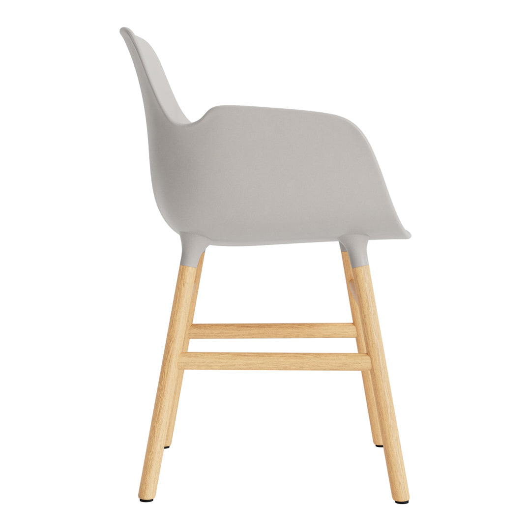 Light gray chair with sleek design and natural wooden legs, showcasing modern minimalism.