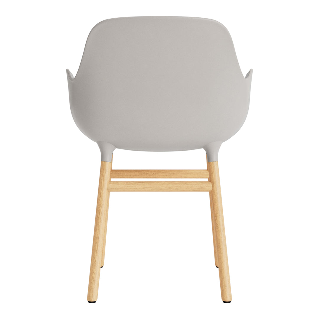 Gray chair with a smooth finish and light wooden legs, showcasing a minimalistic design.