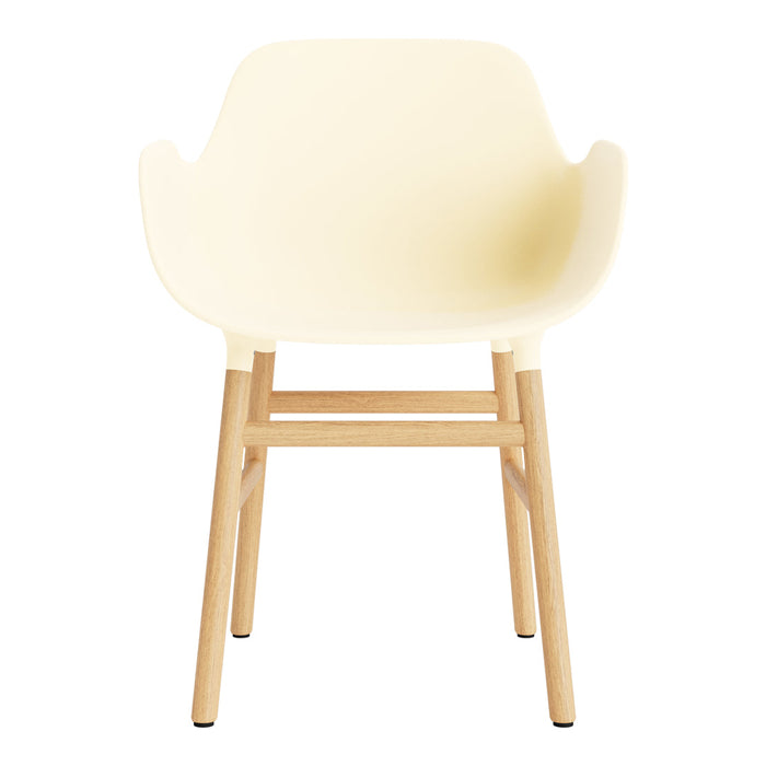 Cream-colored chair with a smooth, curved seat and natural wood legs, offering a minimalist design.
