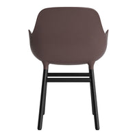 Brown armchair with a sleek modern design, featuring a matte finish and contrasting black legs. Ideal for stylish spaces.