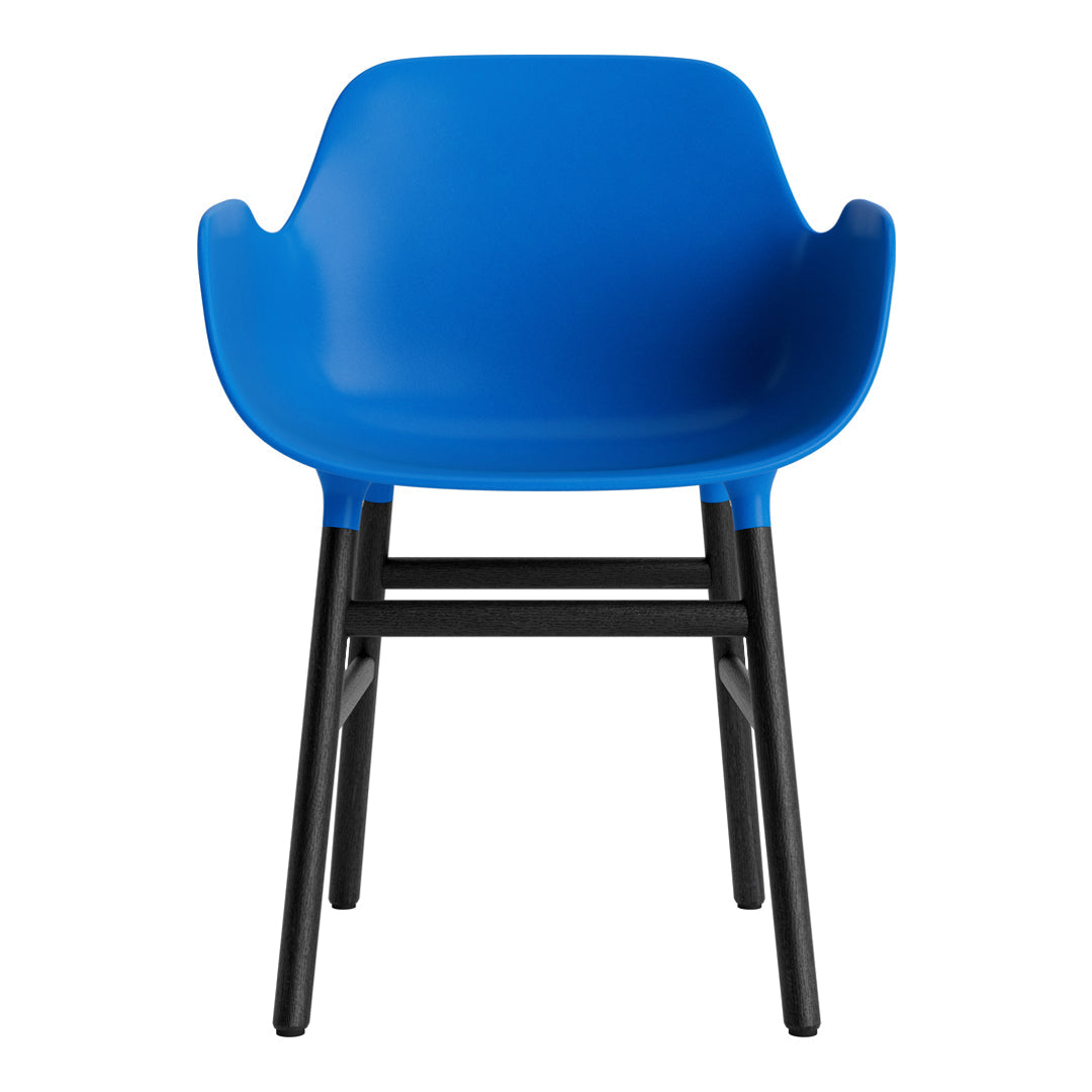 Bright blue plastic chair with sleek black legs, featuring a smooth, modern design. Perfect for contemporary spaces.