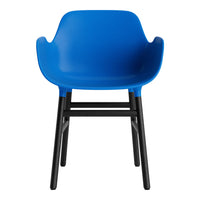 Bright blue plastic chair with sleek black legs, featuring a smooth, modern design. Perfect for contemporary spaces.