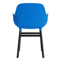 Vibrant blue chair with smooth, curved backrest and sleek black legs, ideal for modern decor.