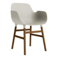 Light gray modern chair with a smooth, curved design and natural wood legs, perfect for contemporary decor.