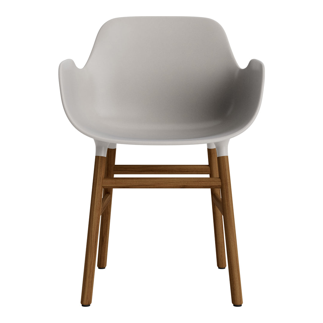Modern white curved chair with wooden legs, showcasing a sleek minimalist design. Ideal for contemporary settings.