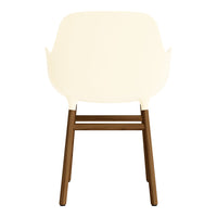 Cream-colored chair with a smooth finish and natural wood legs, showcasing minimalistic design and modern elegance.