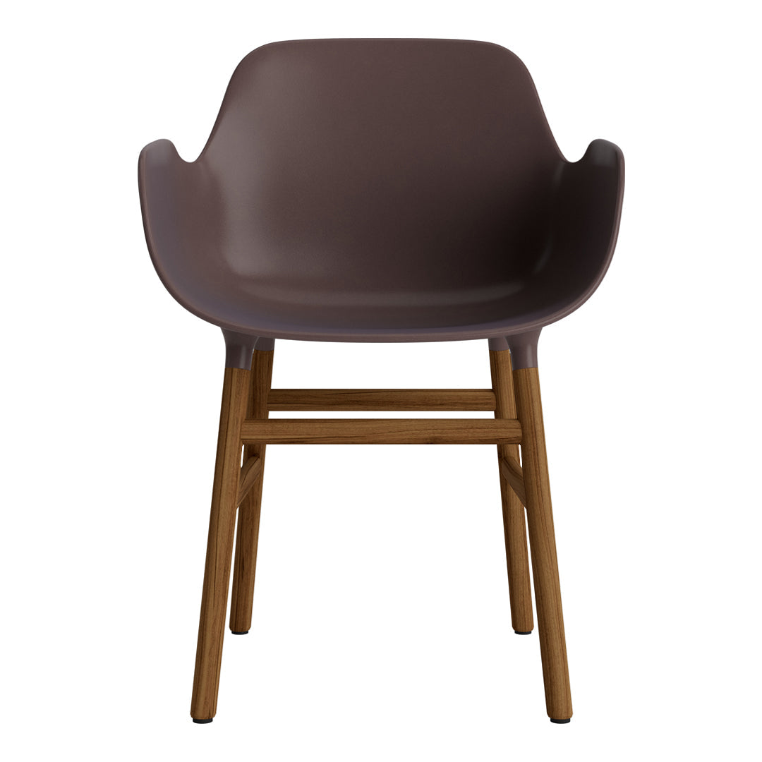 Brown molded chair with smooth finish and wooden legs, showcasing a modern and minimalist design.