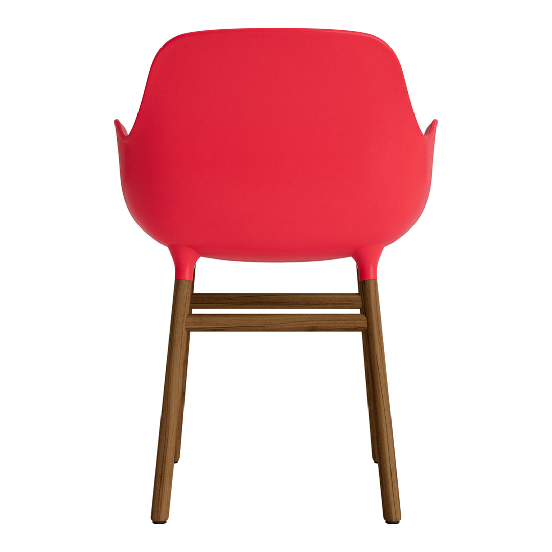 Bright red chair with a smooth finish and brown wooden legs, perfect for adding a pop of color to any space.