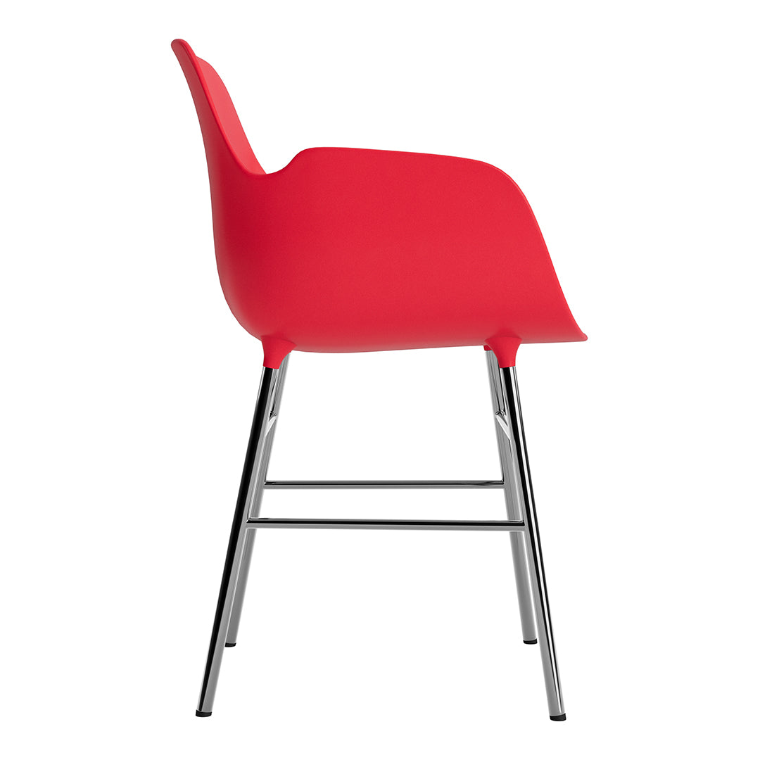 Red molded plastic chair with a sleek chrome frame, perfect for modern decor.