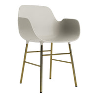 Modern white chair with smooth curves and sleek gold legs, showcasing a minimalist design. Ideal for contemporary decor.