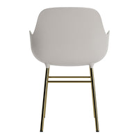 Light gray chair with gold metal legs, featuring a minimalist design and smooth, modern contours.