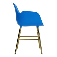 Vibrant blue chair with a smooth finish and sleek gold metal legs. Modern, minimalist design.