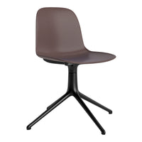 Brown plastic chair with a sleek design and black metal base. Perfect for modern interior decor.