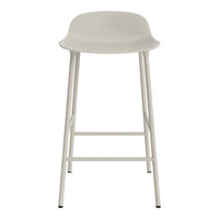 Light gray stool with a smooth, minimalist design and contrasting white metal legs. Perfect for modern spaces.