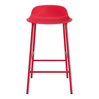 Red bar stool with a sleek, modern design and minimalistic pattern, featuring a sturdy metal frame.