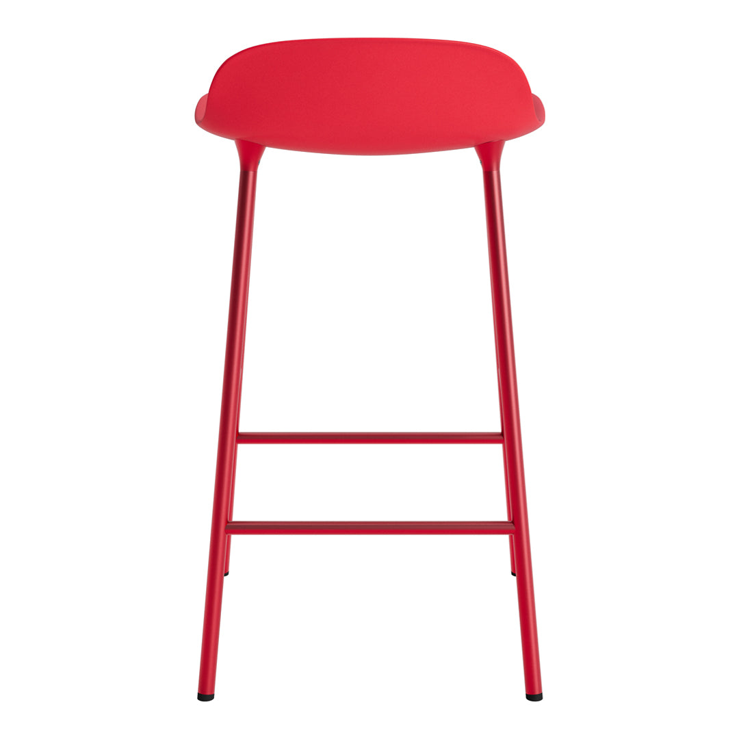 Bright red bar stool with a smooth, minimalist design and sleek metal legs. Ideal for modern decor.
