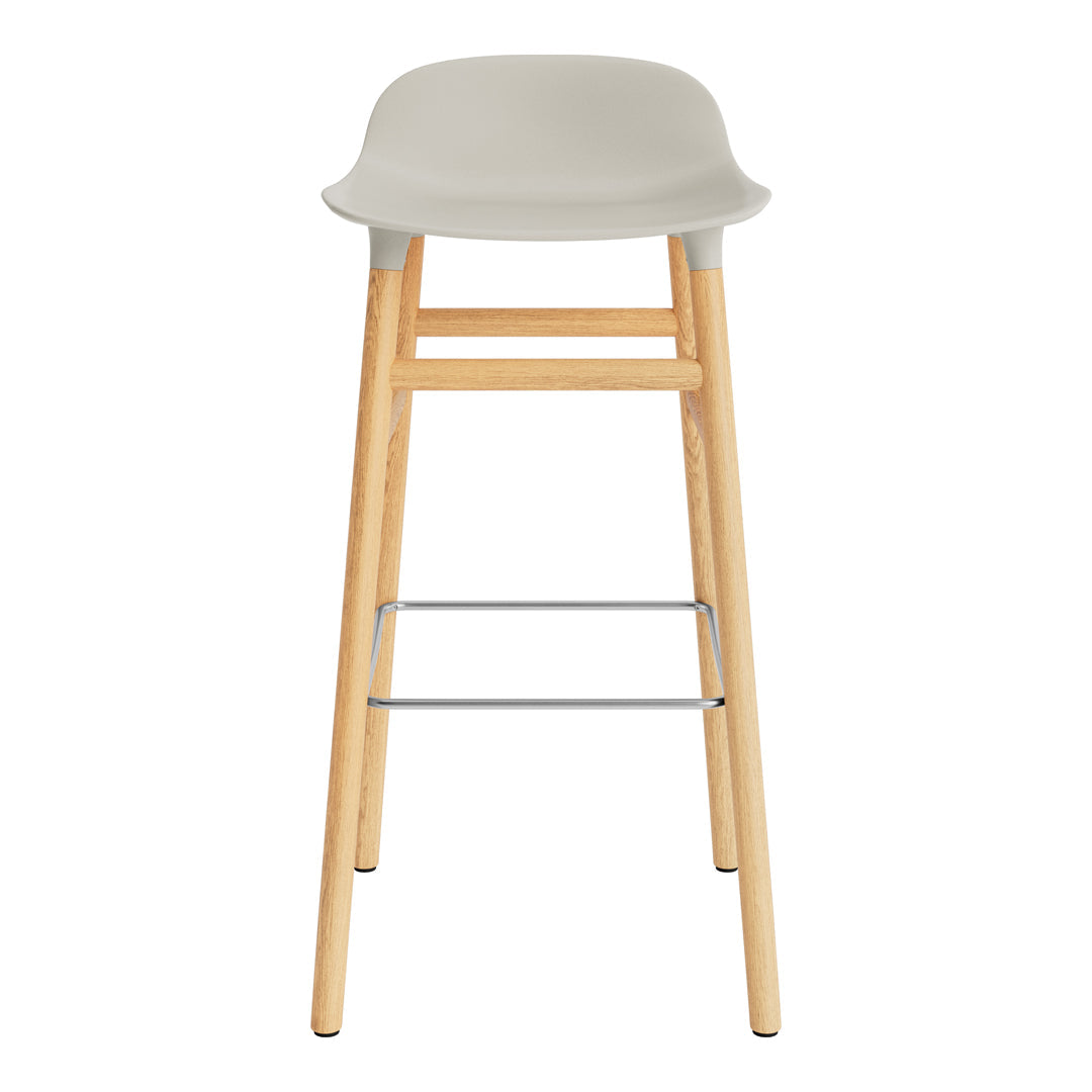 Gray plastic stool with natural wood legs and a silver footrest, featuring a smooth, minimalist design.