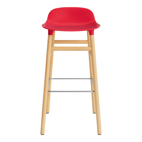 Red high chair with a smooth seat and natural wood legs featuring a stainless steel footrest. Modern and stylish design.