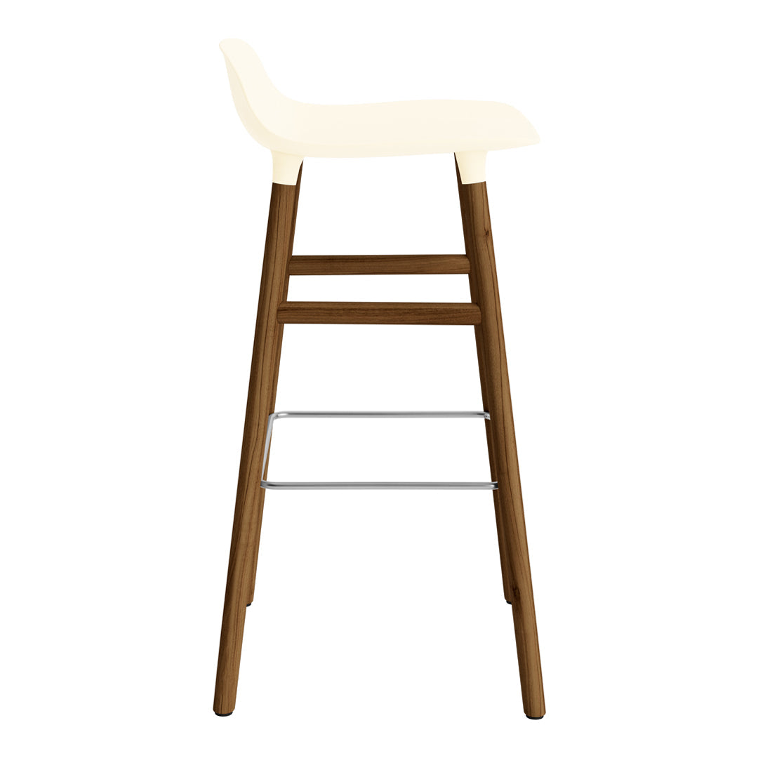 Cream bar stool with a minimalist design, featuring a smooth seat and dark wood legs contrasted by silver accents.