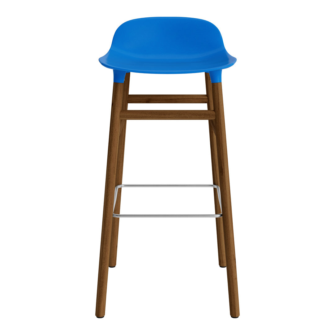 Blue plastic seat bar stool with classic wooden legs and silver footrest, creating a modern, stylish design.
