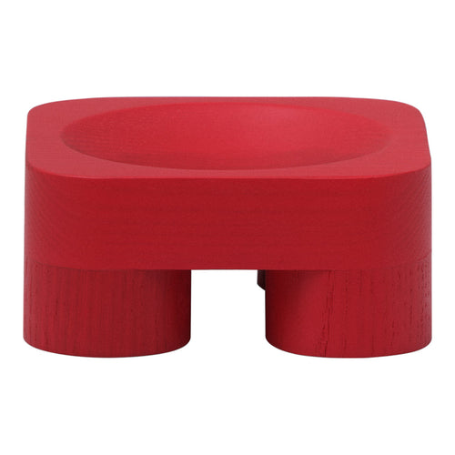 Vibrant red sculptural bowl with a smooth surface and a unique, modern design. Perfect for contemporary decor.