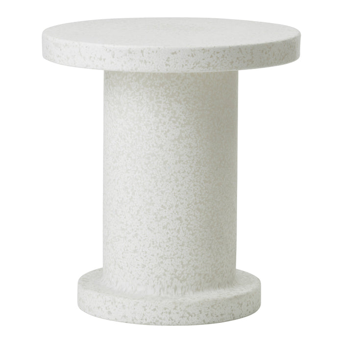 White speckled side table with a smooth round top and cylindrical base, perfect for minimalist decor.