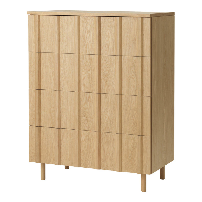 Light oak chest of drawers with a minimalist design, featuring vertical paneling and natural wood grain.