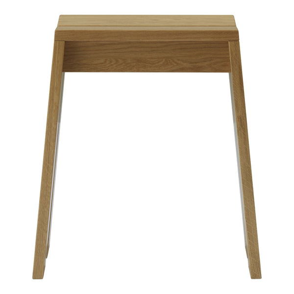 Light oak wood desk with a smooth finish and minimalist design, featuring clean lines and a natural wood grain.