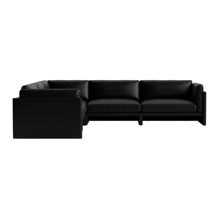 Black leather sectional sofa with a sleek, minimalist design and matching cushions for modern decor.