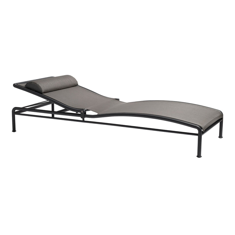 Gray lounge chair with sleek, minimalist design and black metal frame, perfect for outdoor styling.