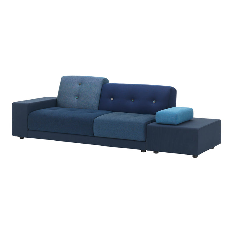 Modern blue sofa with a gradient pattern, featuring dark and light blue upholstery and stylish button accents.