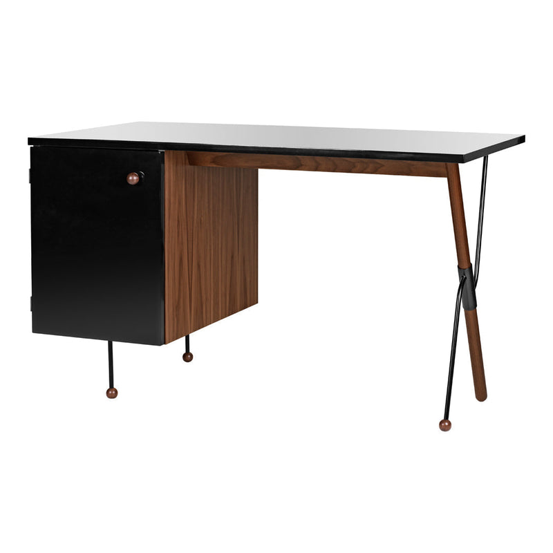 Modern black and walnut desk with sleek lines and contrasting textures, featuring a minimalistic design.