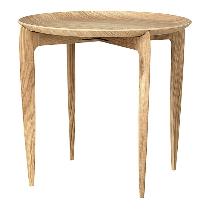 Natural wood finish round table with smooth, light oak color and elegant minimalist design.