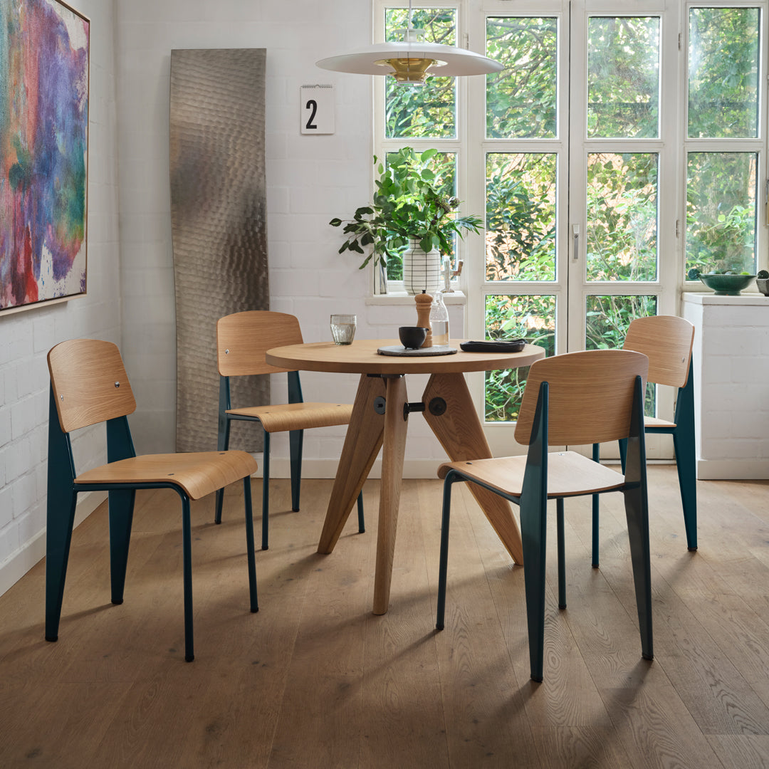 Light wood dining set with blue accents and natural textures, featuring minimalist design and clean lines.