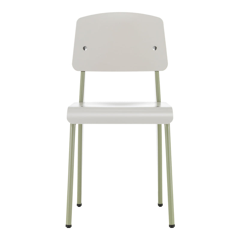 Minimalist white chair with pale green metal legs, featuring a sleek, contemporary design. Perfect for modern decor.