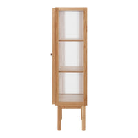 Tall wooden cabinet in natural oak finish with clear glass panels and simple, vertical line pattern on doors.
