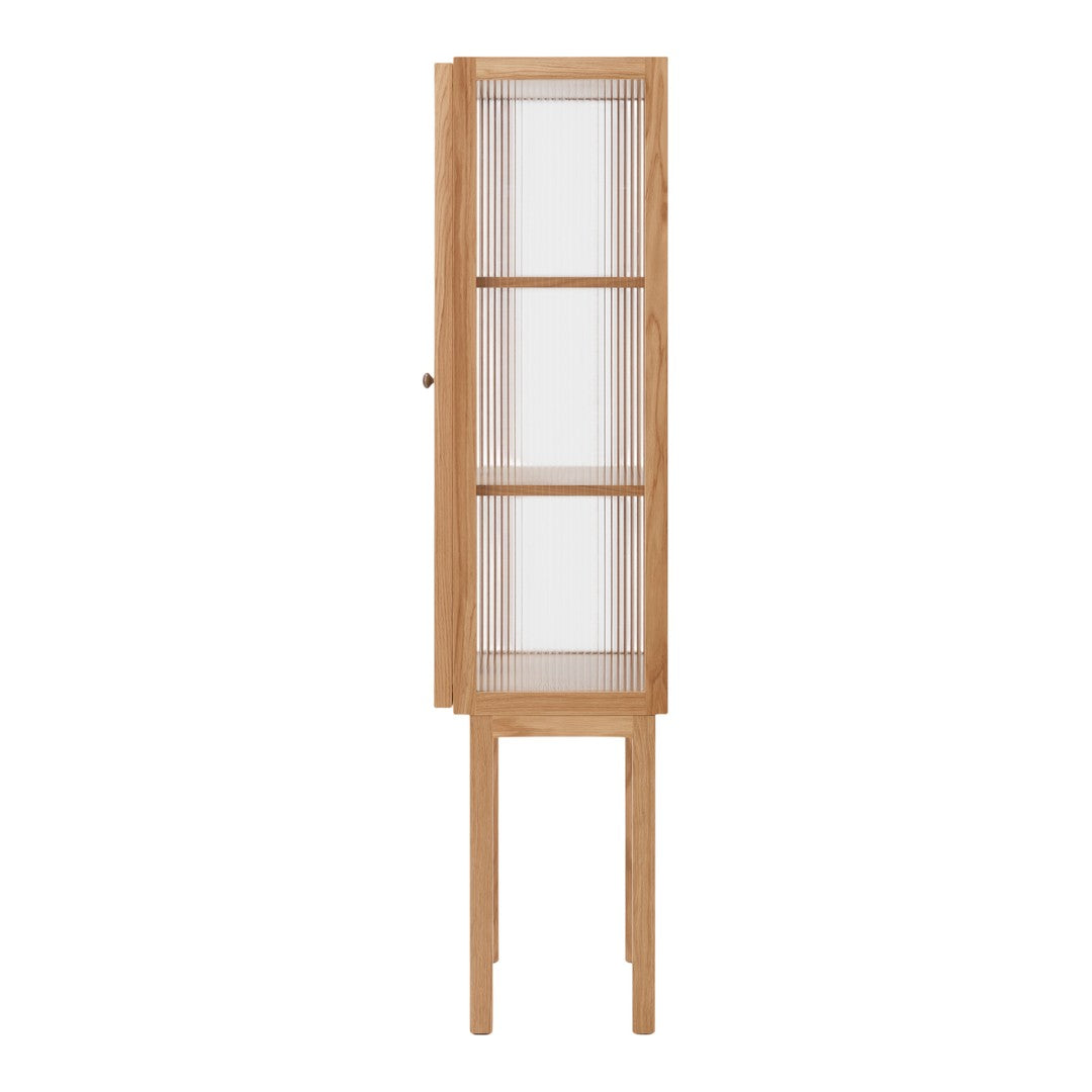 Light oak finish cabinet with glass shelves and a minimalist design, showcasing natural wood grain patterns.