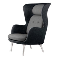 Stylish armchair in dark gray and light gray tones, featuring a smooth fabric texture and sleek, contemporary design.