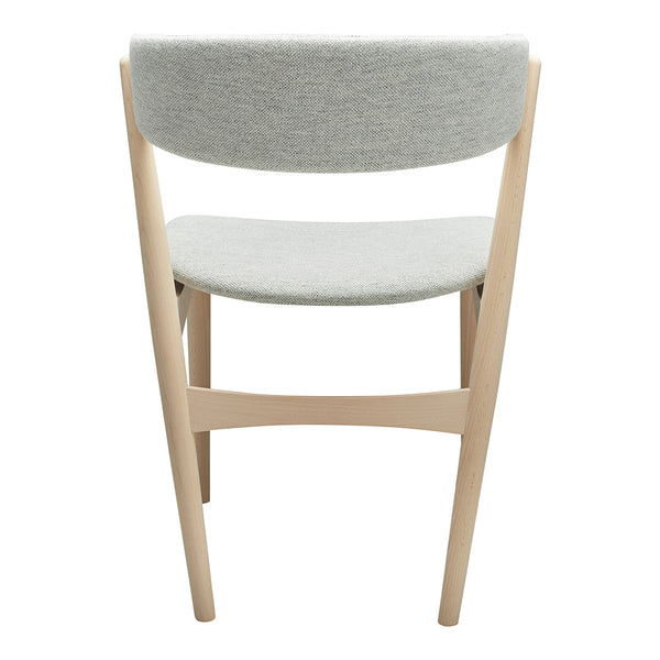 Light gray upholstered chair with a natural wood frame, featuring a simple, modern design.