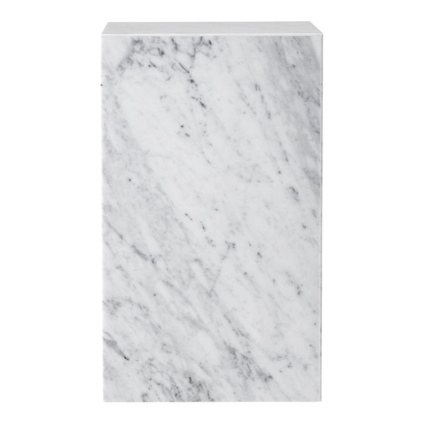 White marble pedestal with gray veining pattern, showcasing natural texture and elegant finish. Perfect for modern decor.
