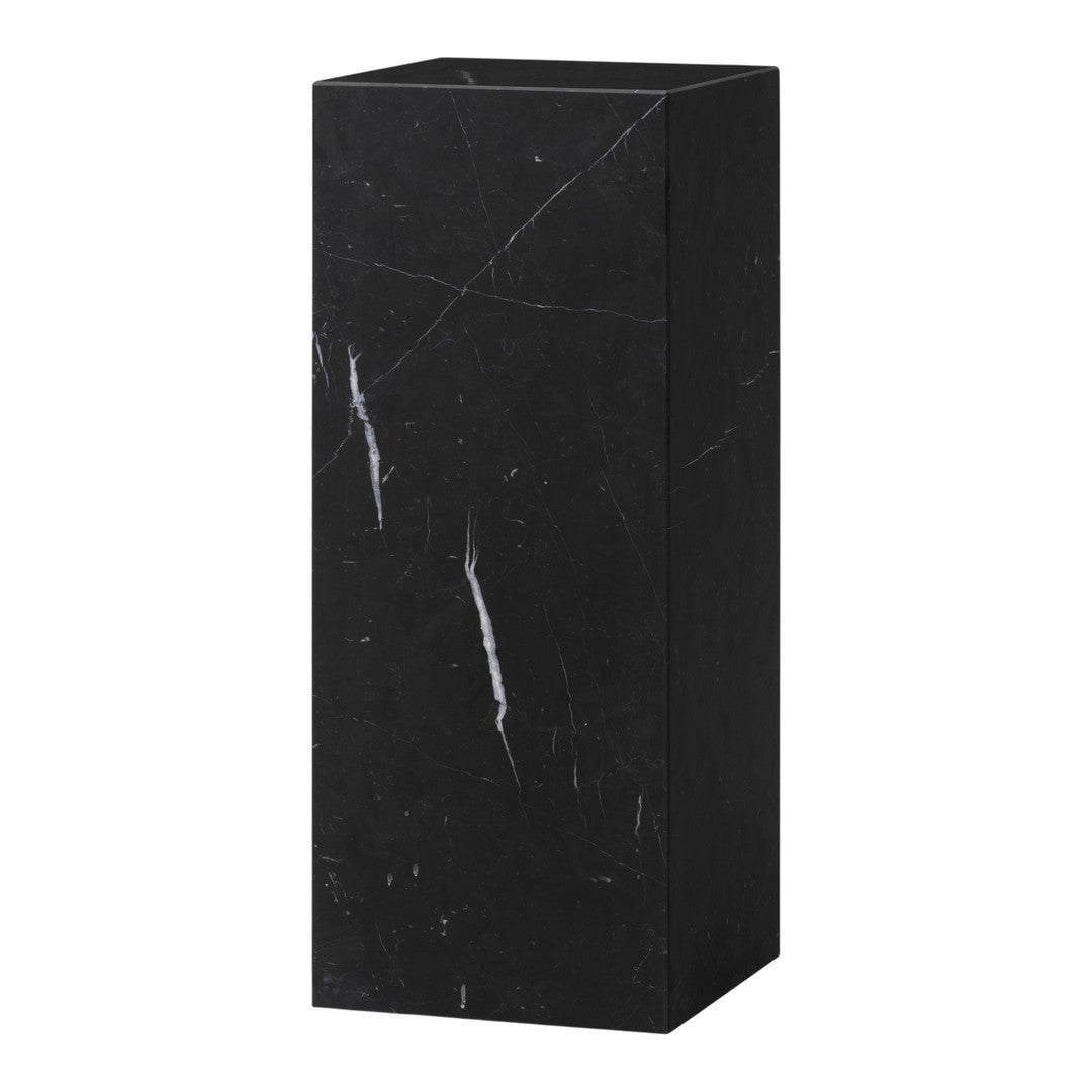 Sleek black marble pedestal with distinctive white veining, perfect for minimalistic decor.