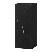 Sleek black marble pedestal with distinctive white veining, perfect for minimalistic decor.