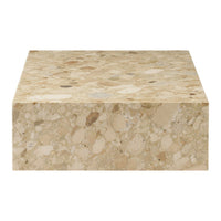 Beige stone block with a smooth surface, featuring subtle patterns and varied light brown flecks throughout.