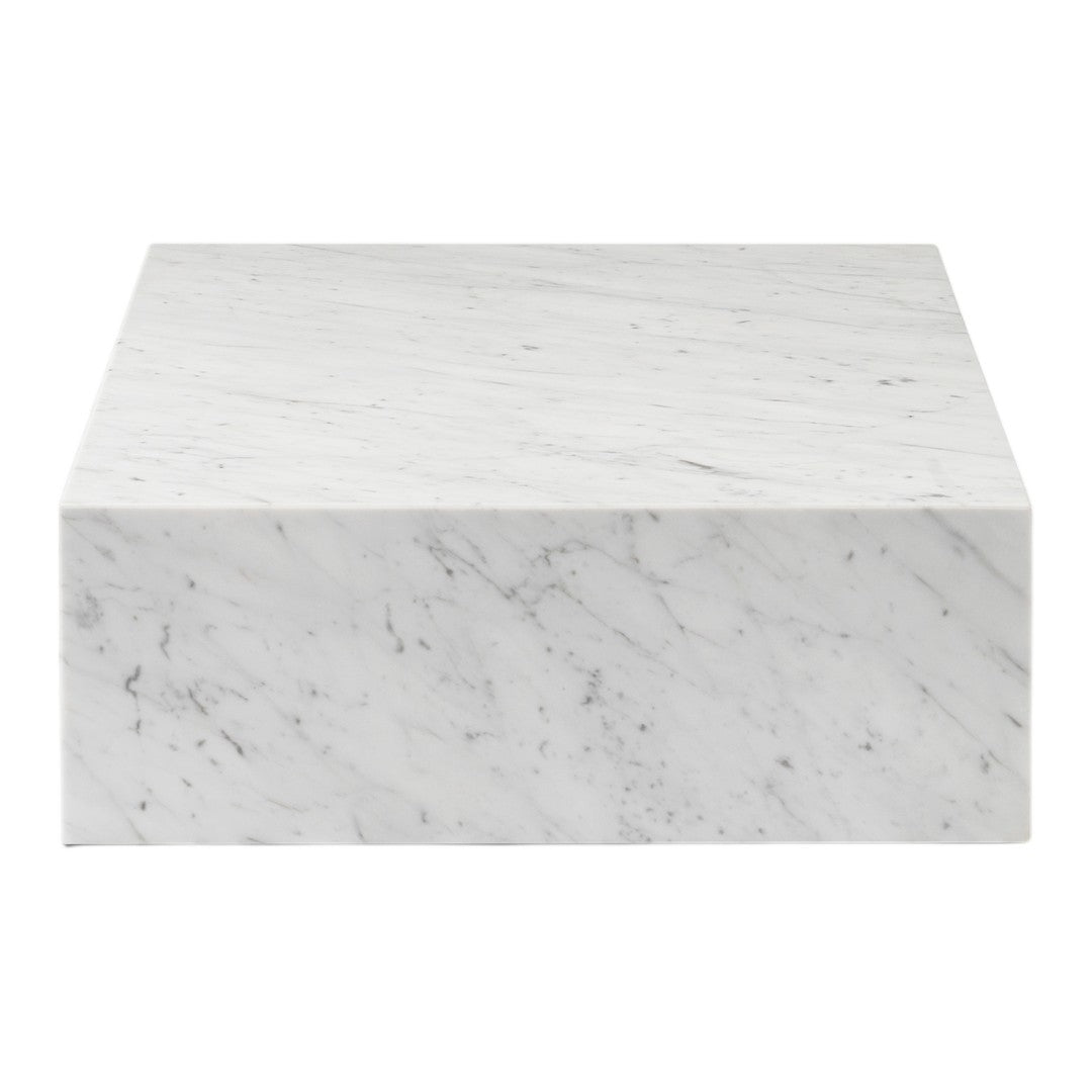 White marble block with subtle gray veining and a smooth, polished finish. Perfect for elegant decor.