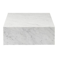 White marble block with subtle gray veining and a smooth, polished finish. Perfect for elegant decor.