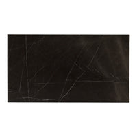 Black marble slab with subtle white veining and a polished finish, ideal for elegant home decor or countertops.