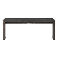 Modern dark marble dining table with subtle veining, showcasing a sleek, minimalistic design. Perfect for contemporary spaces.
