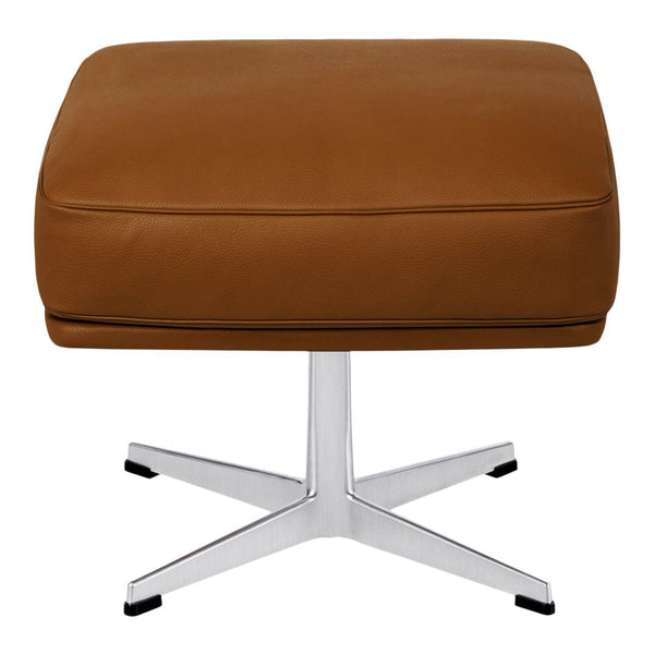 Brown leather ottoman with a sleek silver chrome base and minimalist design, perfect for modern interiors.